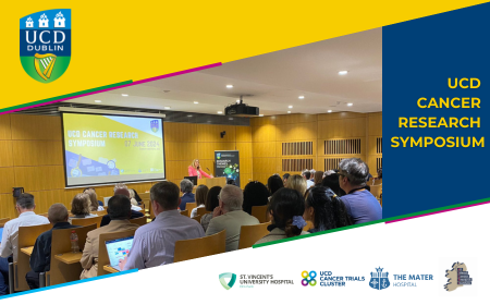 Image of people attending the UCD Cancer Research Symposium at the UCD Conway on 7th June 2024. The logos of UCD, the UCD Cancer Trials Cluster, St Vinctent's and the Mater Hospital are present. The text 'UCD Cancer Trials Cluster' is overlayed on the image.